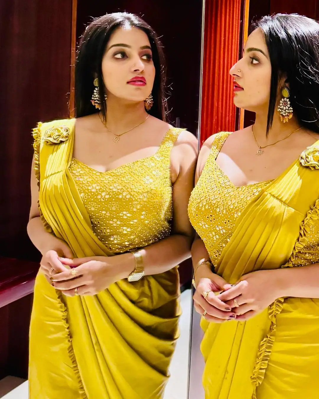 malayalam actress malavika menon in yellow saree sleeveless blouse